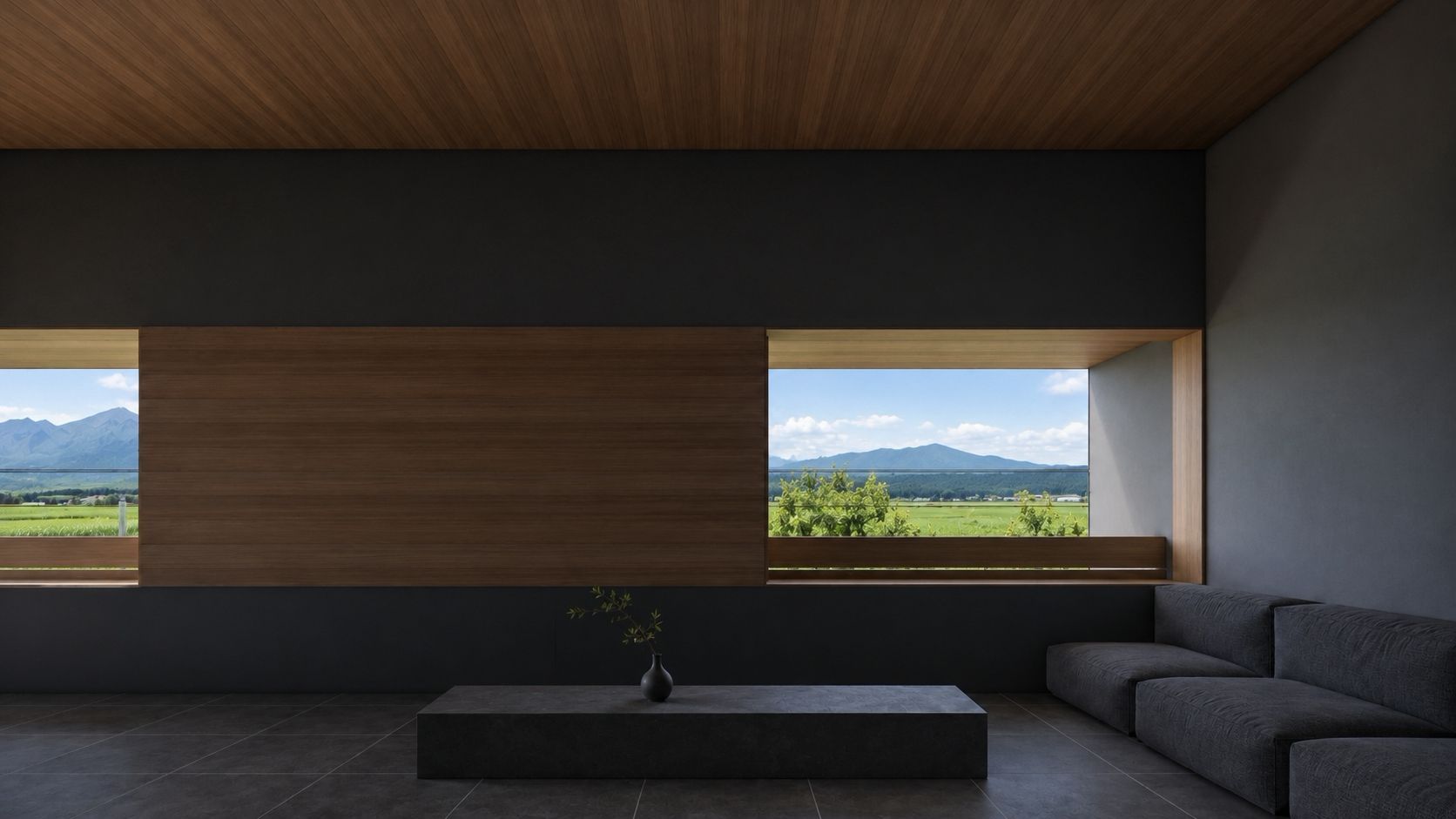 A living-room window framing the mountains
